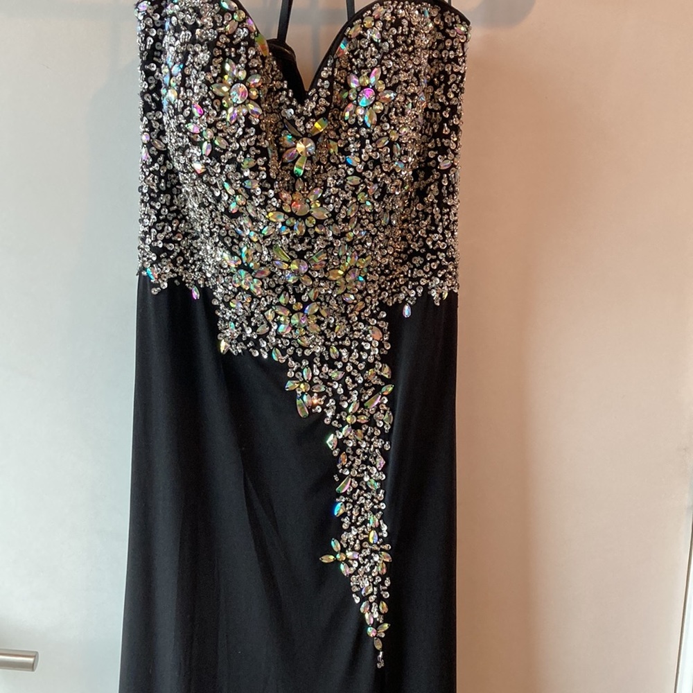Long bejeweled black prom dress with thin straps and slit up to the thigh. - Picture 2 of 12